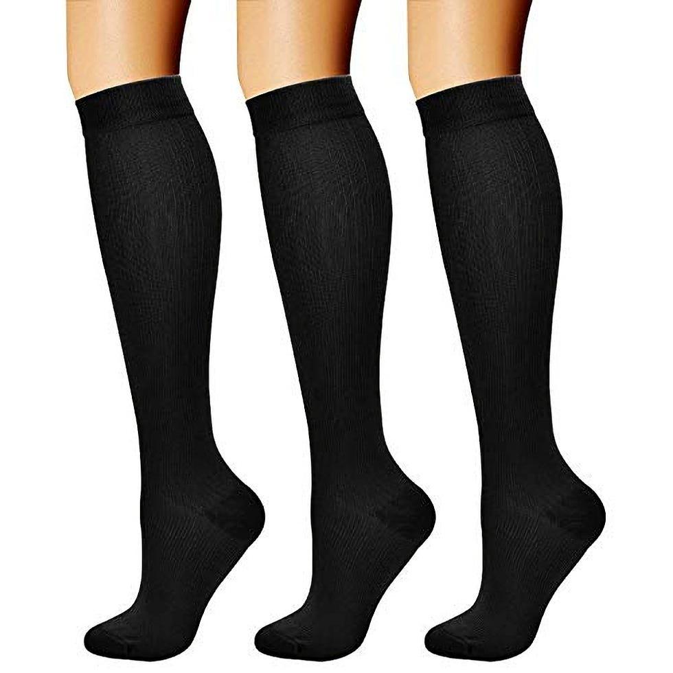 Accessoires essentiels pour un voyage, les chaussettes de compression graduée feifanshop