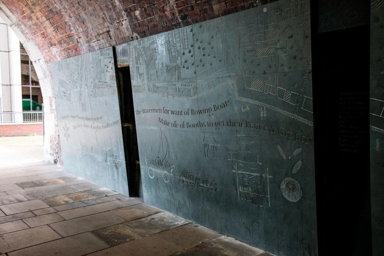 Underneath the bridge are plaques celebrating its history.